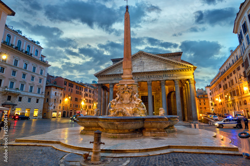 The Pantheon with fountain and obelisk at dusk in Rome, Italy