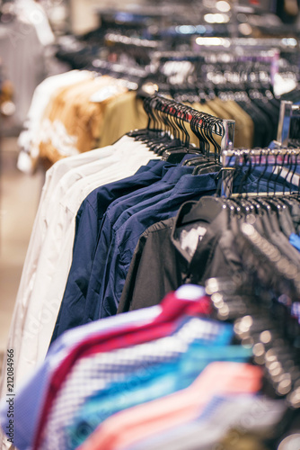 Men's shirts on the hanger in the store