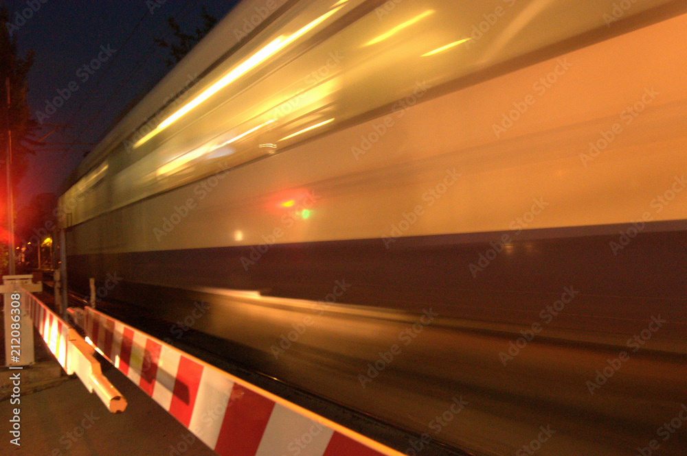 Train blurred image, night crossing junction quick Train blurred image, night crossing junction quick