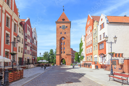 Elblag ( Elbląg) in polish Pomerania - Stary Rynek Street is center of Old Town, with rebuilt tenement houses. Street is closed at end of medieval  Market Gate (Brama Targowa)