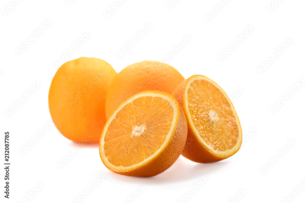 close up view of wholesome and cut oranges isolated on white close up view of wholesome and cut oranges isolated on white