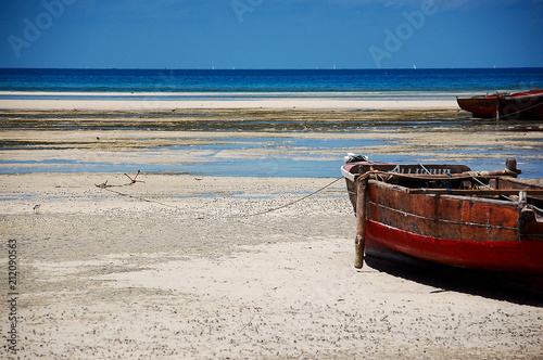 boat with anchor on the shores of zanzibar