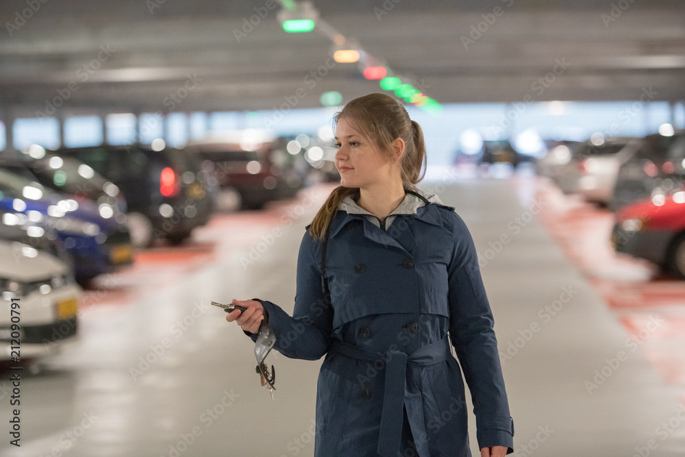 Fototapeta premium woman in parking garage