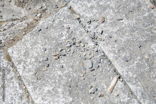 concrete slabs covered with gravel