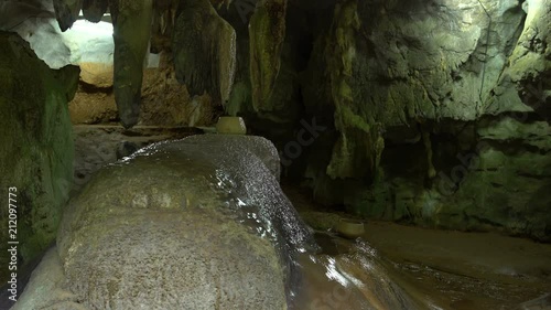 Stalactites in karst caves photo