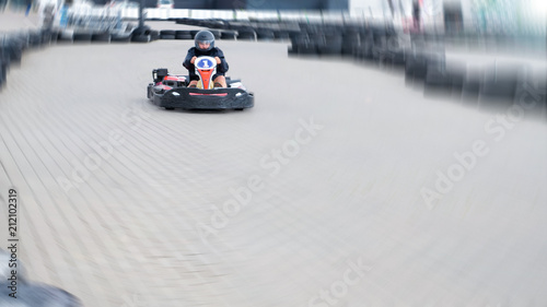 Go kart speed, indoor opposition race. Karting competition or racing cars riding