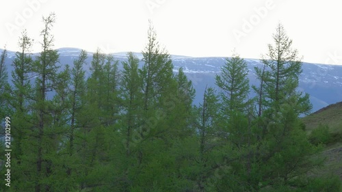 Beautiful view of the valley and snow mountains. Mountain landscape. photo