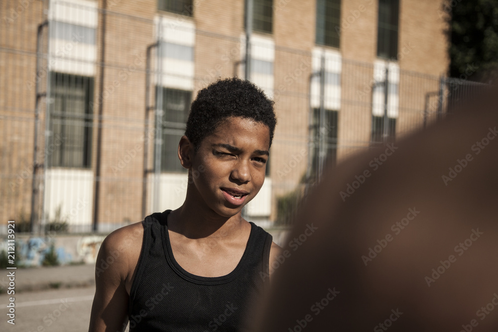 Afro young brothers play basketball Afro young brothers play basketball