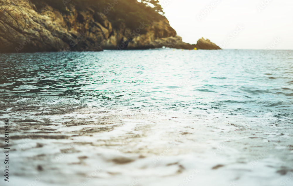 coastline beach on sunny day background of ocean and sky, gold sand close up blur, tourism relax calm concept mockup, seascape perspective vacation, summer seashore on blue sea waves coastline beach on sunny day background of ocean and sky, gold sand close up blur, tourism relax calm concept mockup, seascape perspective vacation, summer seashore on blue sea waves