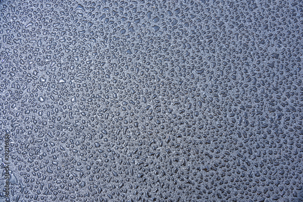 texture of asphalt with drops of water texture of asphalt with drops of water