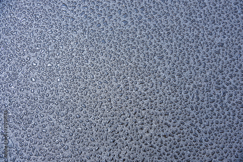 texture of asphalt with drops of water