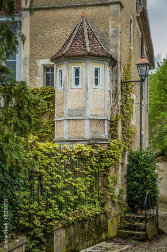 Tower and stone house in the picturesque town of Noyers sur Serein, Burgundy