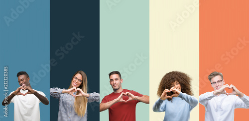 Group of people over vintage colors background smiling in love showing heart symbol and shape with hands. Romantic concept. photo