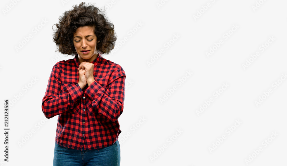 Beautiful arab woman crying depressed full of sadness expressing sad emotion