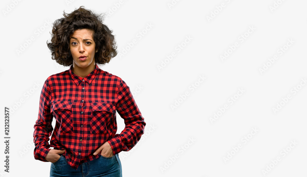 Beautiful arab woman happy and surprised cheering expressing wow gesture Beautiful arab woman happy and surprised cheering expressing wow gesture