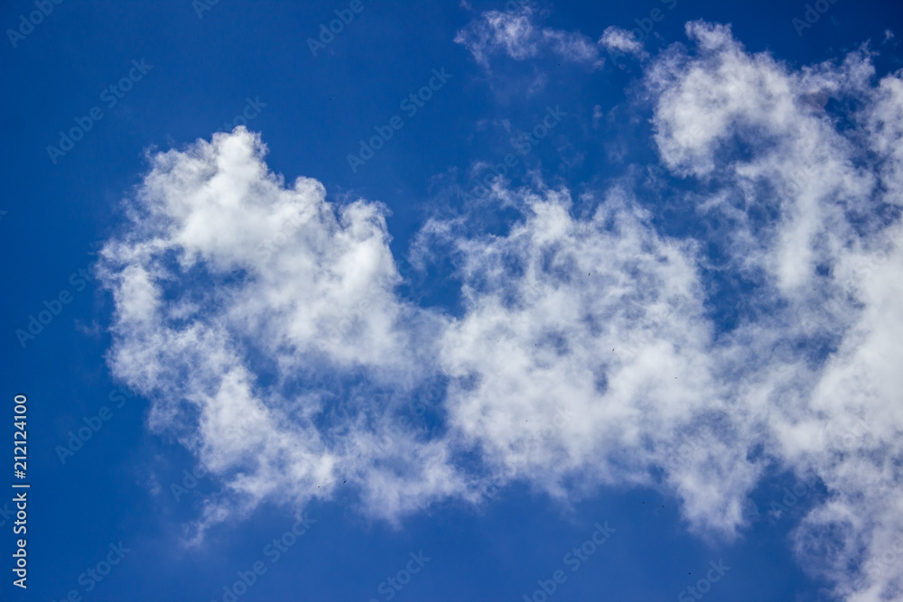 Clouds against blue sky as background Clouds against blue sky as background