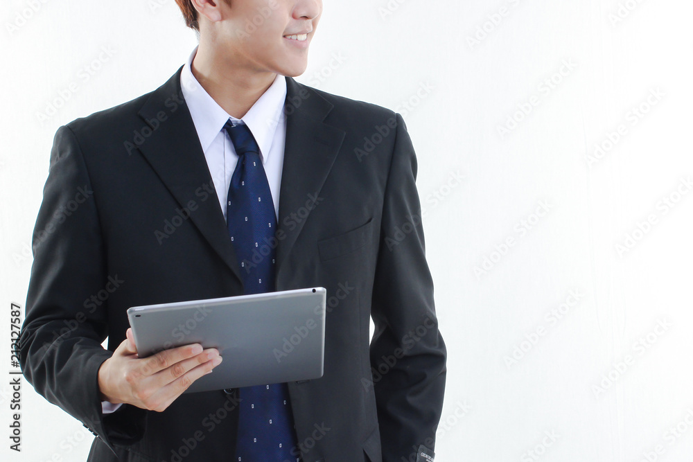 Businessman using tablet computer with copy space Businessman using tablet computer with copy space