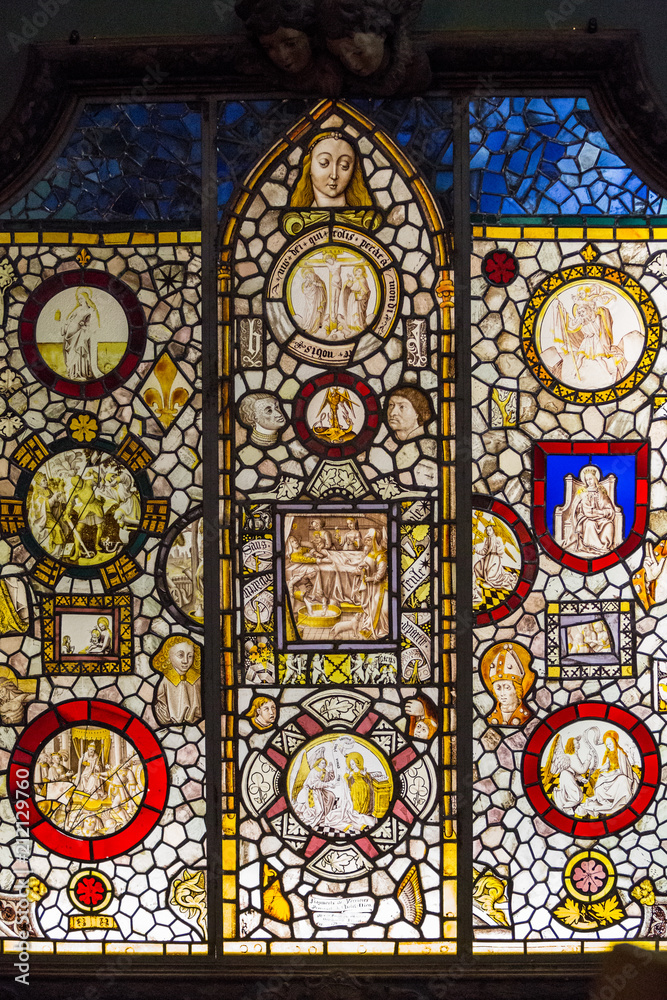 Stained glass window details inside the Hôtel-Dieu de Beaune, a former hospital and alms house in Beaune