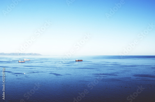 several ships in the open sea © javiemebravo