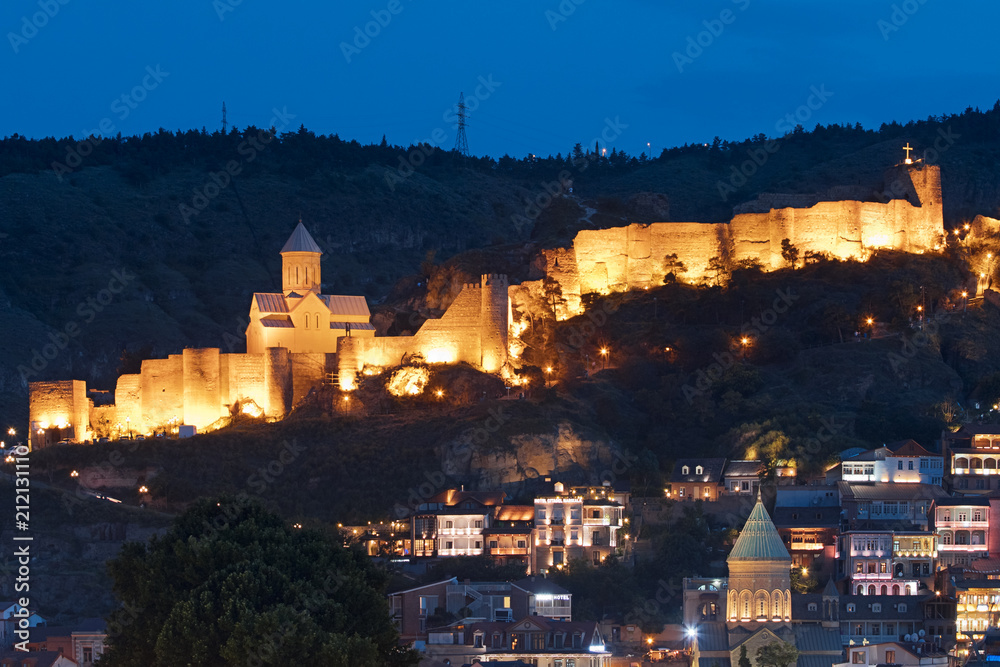 Narikala Fortress and St. Nicholas Church in Tbilisi Georgia by night 