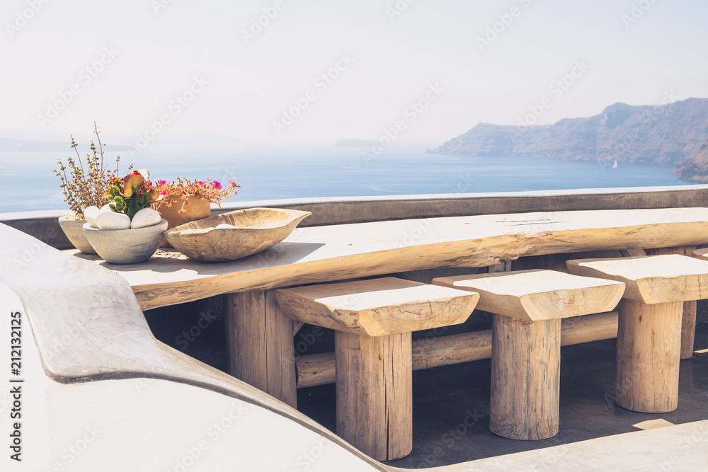 Beautiful vintage wooden table and chairs on terrace, Santorini