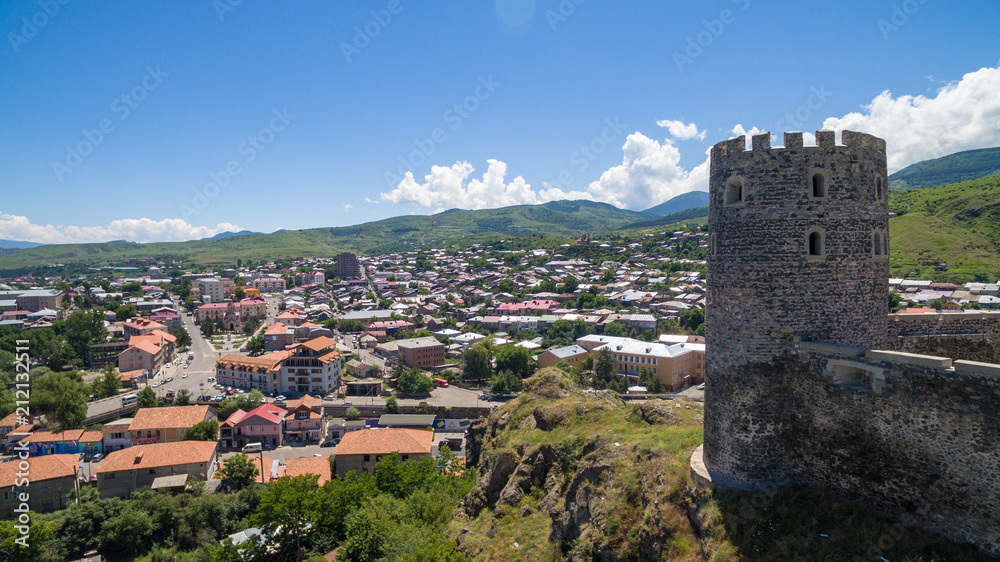 ancient fortress tower against the background of the city