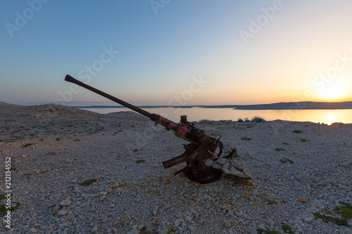 Abandoned rusty canon on Croatian coast at Paklenica Canyon, Croatia