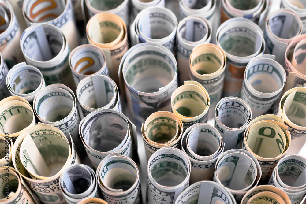 US dollars are exhibited in rows rolled up in tubules US dollars are exhibited in rows rolled up in tubules
