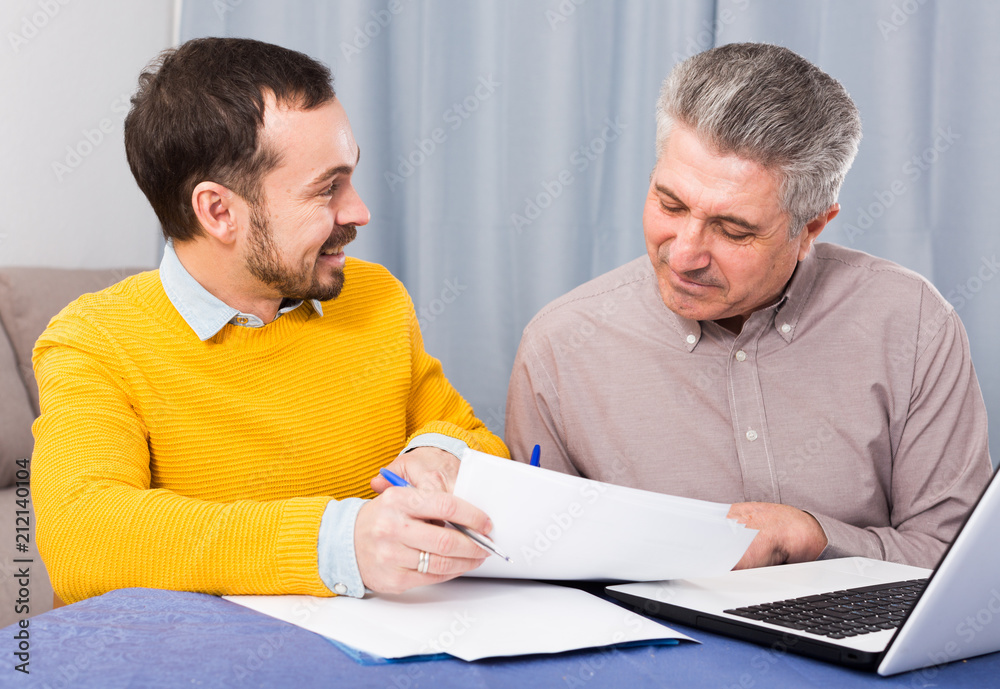 Fototapeta premium Man and sales manager discuss contract