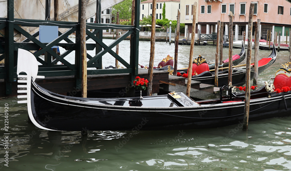 Close up on Italian gondola in Venice canal.