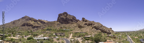 This is a 4 image aerial panoramic of iconic Camelback Mountain in Phoenix, Arizona, USA