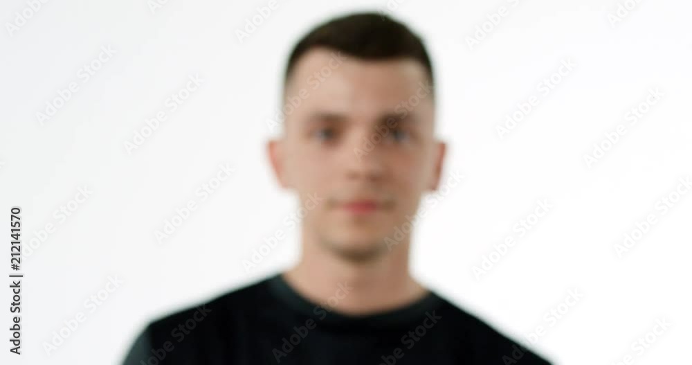Male athlete appears in view from a blur Male athlete appears in view from a blur