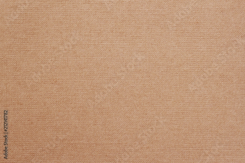 Canvas, fabric background with visible texture, print design elements. Closeup of warm, soft coffee color jute, texture pattern for backdrop