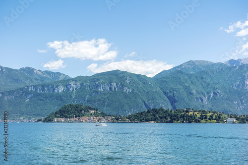 Lago di Como in Italy and Blooming Red Geranium Flowers ,Como Lake Background