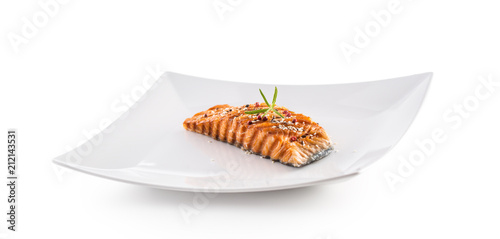 Grilled salmon fillet with sesame herb and pepper.