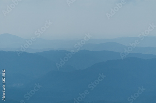 A series of mountain ridges receding into the blue haze. In North Carolina, USA.