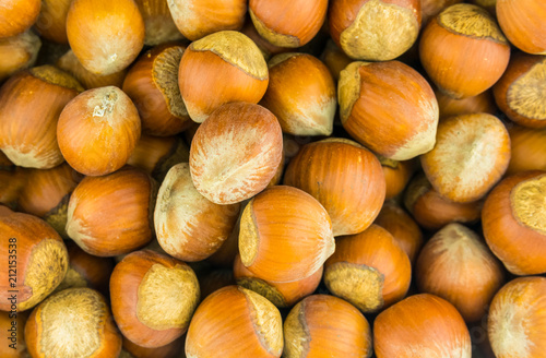 hazelnuts brown whole hazel close-up with a shell close-up background pattern autumn theme base food
