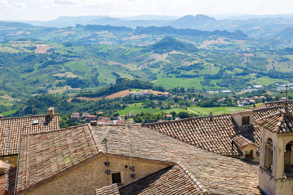 Old roofs and San Marino landscape.