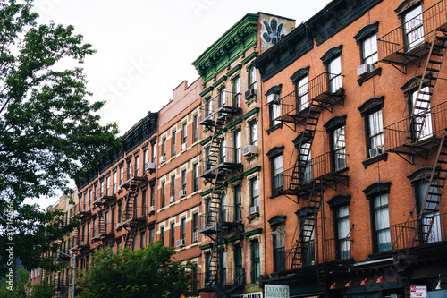 Brick residential buildings in Greenwich Village, Manhattan, New York City. © jonbilous