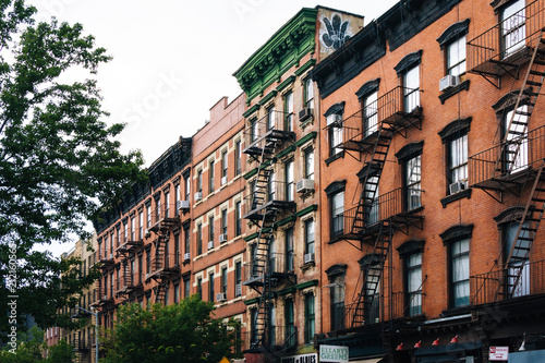 Brick residential buildings in Greenwich Village, Manhattan, New York City. © jonbilous