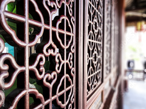 Ancient style of curved chinese wood window in historic water town of nanxun zhejiang china photo