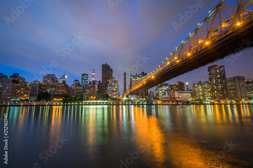 The Queensboro Bridge at night, seen from Roosevelt Island in New York City. © jonbilous