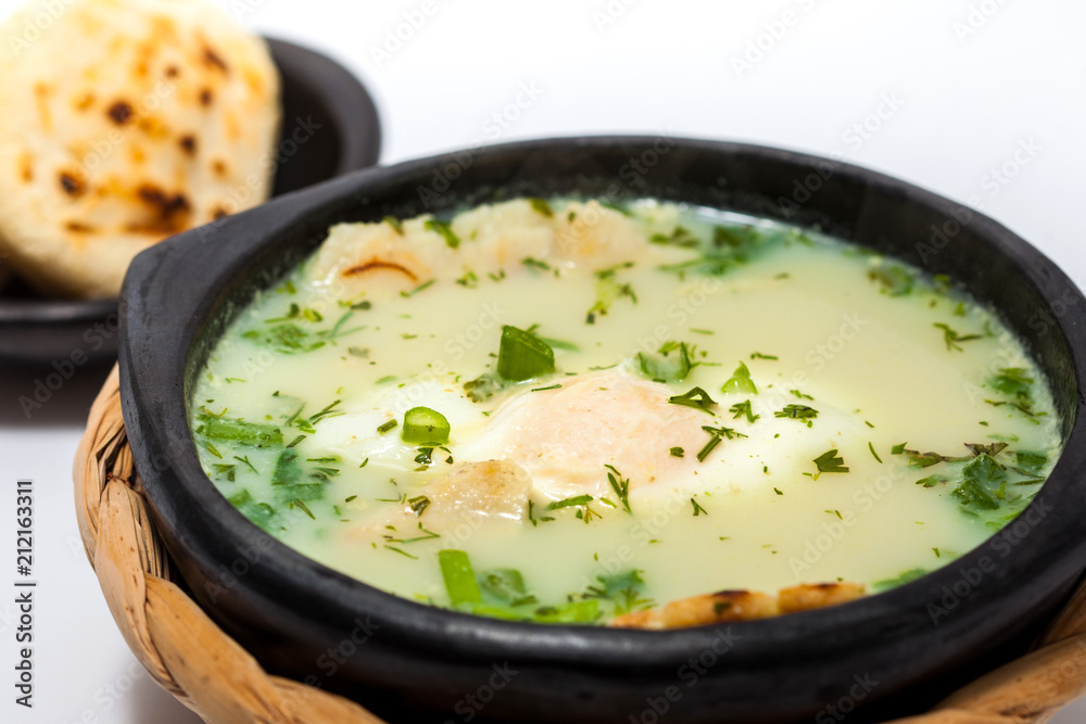 Traditional Colombian Poached Egg Soup called changua Traditional Colombian Poached Egg Soup called changua