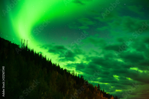 The Northern Lights Shine Up over a Mountainside near Valdez Alaska © Christopher Boswell