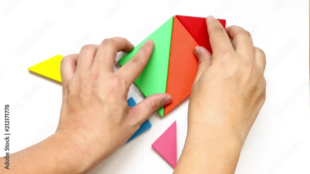 Man complete tangram puzzle in rocket or missile shape on white background (Concept for exploration, new experience,start up business)