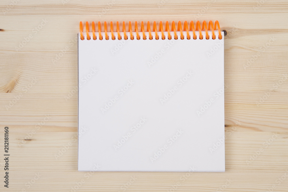 pencil, pen and notebook on a wood background. top view. pencil, pen and notebook on a wood background. top view.