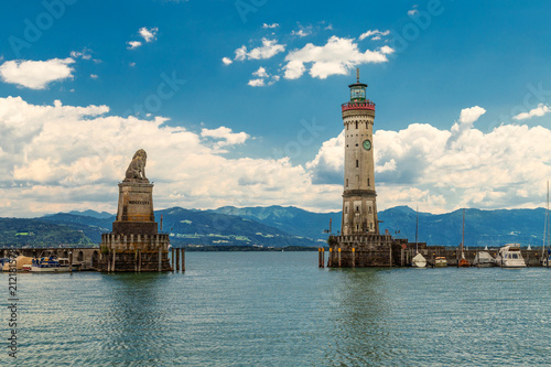 The Lindau Lighthouse and a Lion sculpture at the lake Constance (Bodensee) in Germany, Bavaria
