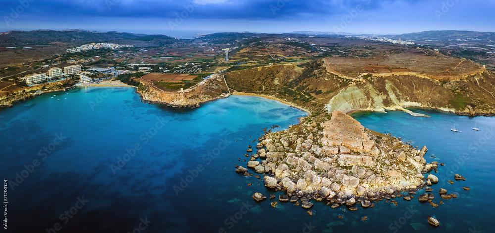 Ghajn Tuffieha, Malta - Aerial panoramic skyline view of the coast of Ghajn Tuffieha with Golden Bay, Riviera Bay, Ghajn Tuffieha Watch Tower and other sandy beaches