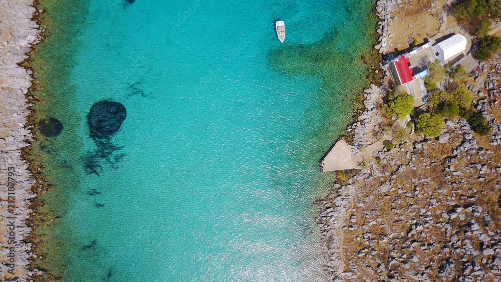 Aerial birds eye view photo taken by drone of famous tropical beach of Agia Marina, Symi island, Dodecanese, Greece