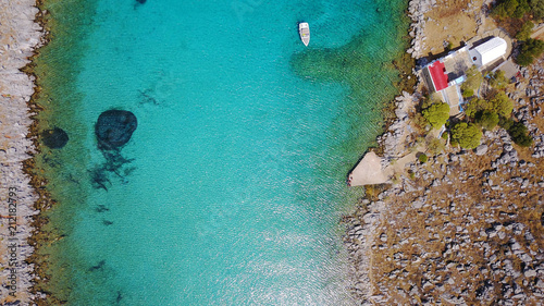 Aerial birds eye view photo taken by drone of famous tropical beach of Agia Marina, Symi island, Dodecanese, Greece © aerial-drone